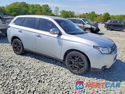 Czwarte zdjęcie samochodu z boku: 2014 MITSUBISHI OUTLANDER SE VIN:JA4AD3A36EZ019992 - miniatura