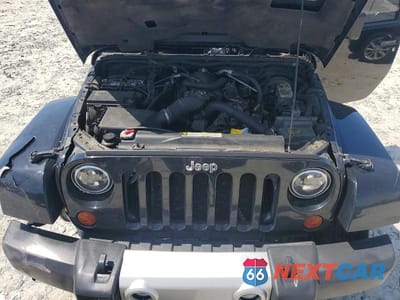 Zdjęcie 12 z 12 samochodu: 2010 JEEP WRANGLER UNLIMITED SAHARA VIN:1J4HA5H15AL213434 - miniatura