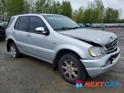 Czwarte zdjęcie samochodu z boku: 2000 MERCEDES-BENZ ML 430 VIN:4JGAB72E3YA208889 - miniatura