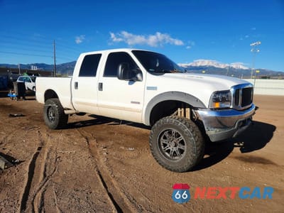 Czwarte zdjęcie samochodu z boku: 2002 FORD F250 SUPER DUTY VIN:1FTNW21FX2EA07370 - miniatura