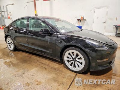 Czwarte zdjęcie samochodu z boku: 2022 TESLA MODEL 3 VIN:5YJ3E1EB9NF290603 - miniatura