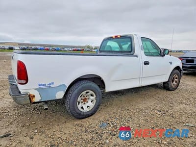 Trzecie zdjęcie samochodu z tyłu: 2001 FORD F150 VIN:1FTPF17M01KB25596 - miniatura