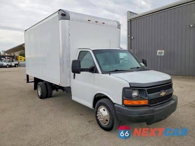 Czwarte zdjęcie samochodu z boku: 2014 CHEV EXPRESS CUTAWAY VIN:1GB3G3CGXE1152926 - miniatura