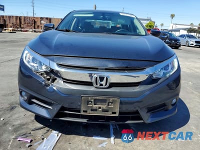 Piąte zdjęcie samochodu w środku: 2018 HONDA CIVIC EXL VIN:JHMFC1F70JX027895 - miniatura