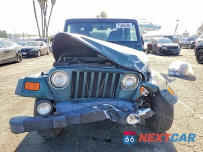 Piąte zdjęcie samochodu w środku: 2000 JEEP WRANGLER / TJ SPORT VIN:1J4FA49S9YP721689 - miniatura