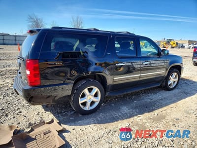 Trzecie zdjęcie samochodu z tyłu: 2010 CHEVROLET SUBURBAN K1500 LTZ VIN:1GNUKKE3XAR100864 - miniatura