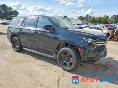 Czwarte zdjęcie samochodu z boku: 2022 CHEVROLET TAHOE C1500 VIN:1GNSCLED6NR269546 - miniatura