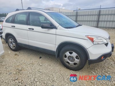 Czwarte zdjęcie samochodu z boku: 2009 HONDA CR-V LX VIN:5J6RE38319L026914 - miniatura