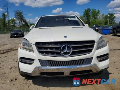 Piąte zdjęcie samochodu w środku: 2012 MERCEDES-BENZ ML 350 4MATIC VIN:4JGDA5HB6CA007708 - miniatura