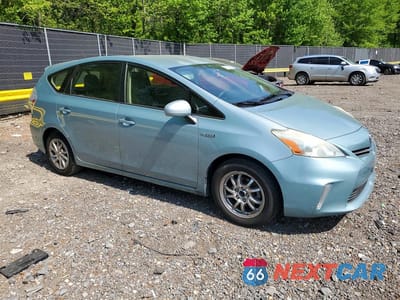 Czwarte zdjęcie samochodu z boku: 2014 TOYOTA PRIUS V THREE VIN:JTDZN3EU0EJ000345 - miniatura