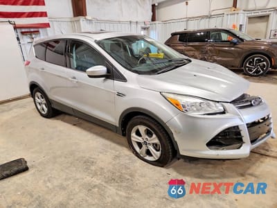 Czwarte zdjęcie samochodu z boku: 2014 FORD ESCAPE SE VIN:1FMCU9GX1EUC98532 - miniatura