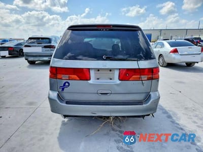 Zdjęcie 6 z 13 samochodu: 2000 HONDA ODYSSEY VIN:2HKRL1851YH548754 - miniatura