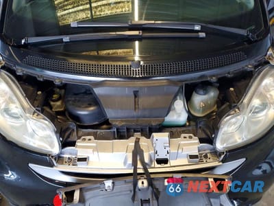 Zdjęcie 11 z 12 samochodu: 2009 SMART FORTWO PURE VIN:WMEEJ31XX9K257332 - miniatura
