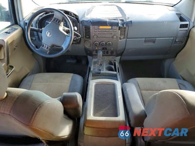 Zdjęcie 8 z 11 samochodu: 2004 NISSAN TITAN XE VIN:1N6AA06A94N559845 - miniatura