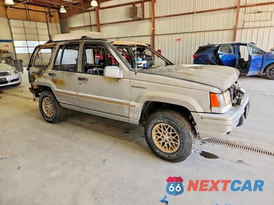 Czwarte zdjęcie samochodu z boku: 1995 JEEP GRAND CHEROKEE LIMITED VIN:1J4GZ78Y7SC680109 - miniatura