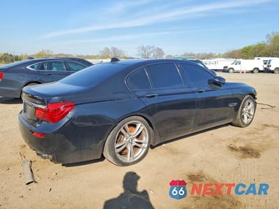 Trzecie zdjęcie samochodu z tyłu: 2015 BMW 750 I VIN:WBAYA8C59FGK19798 - miniatura
