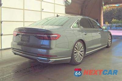 Czwarte zdjęcie samochodu z boku: 2019 AUDI A8 L VIN:WAU8DAF82KN008193 - miniatura