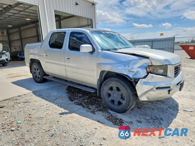 Czwarte zdjęcie samochodu z boku: 2006 HONDA RIDGELINE RTL VIN:2HJYK16586H545871 - miniatura