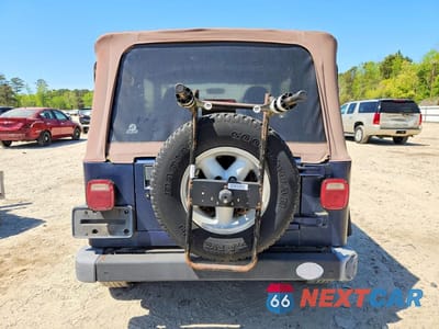 Zdjęcie 6 z 11 samochodu: 2000 JEEP WRANGLER / TJ SPORT VIN:1J4FA49SXYP751820 - miniatura