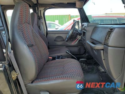 Zdjęcie 10 z 12 samochodu: 2000 JEEP WRANGLER / TJ SE VIN:1J4FA29P5YP702511 - miniatura