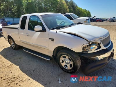 Czwarte zdjęcie samochodu z boku: 2002 FORD F150 VIN:2FTRX17W72CA06182 - miniatura