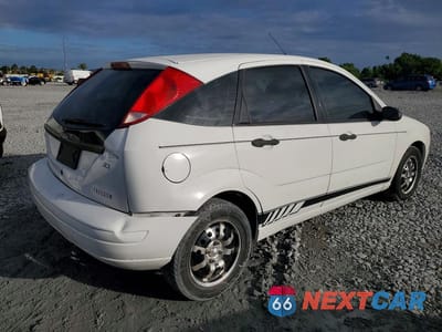 Trzecie zdjęcie samochodu z tyłu: 2007 FORD FOCUS ZX5 VIN:1FAFP37N27W256338 - miniatura