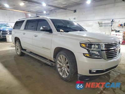 Czwarte zdjęcie samochodu z boku: 2019 CHEVROLET SUBURBAN K1500 PREMIER VIN:1GNSKJKJ7KR247018 - miniatura