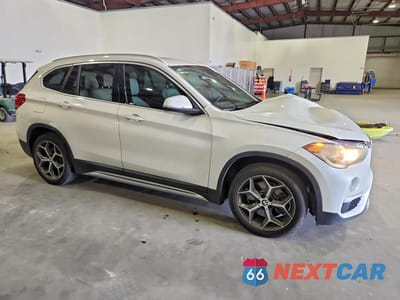 Czwarte zdjęcie samochodu z boku: 2018 BMW X1 SDRIVE28I VIN:WBXHU7C37J5L08554 - miniatura