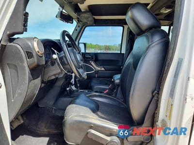 Zdjęcie 7 z 14 samochodu: 2016 JEEP WRANGLER UNLIMITED SAHARA VIN:1C4BJWEG2GL338183 - miniatura