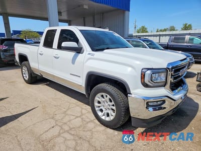 Czwarte zdjęcie samochodu z boku: 2016 GMC SIERRA K1500 SLE VIN:1GTV2MEC1GZ113715 - miniatura