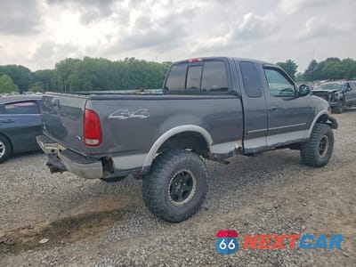 Trzecie zdjęcie samochodu z tyłu: 2002 FORD F150 VIN:1FTRX18L12NA53383 - miniatura