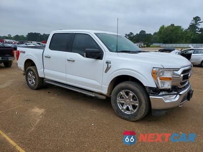 Czwarte zdjęcie samochodu z boku: 2021 FORD F150 SUPERCREW VIN:1FTFW1E57MFD09566 - miniatura
