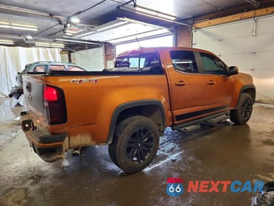 Trzecie zdjęcie samochodu z tyłu: 2017 CHEVROLET COLORADO LT VIN:1GCGTCEN1H1305766 - miniatura