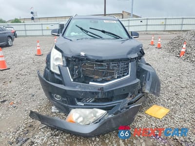 Piąte zdjęcie samochodu w środku: 2016 CADILLAC SRX PERFORMANCE COLLECTION VIN:3GYFNFE31GS563766 - miniatura