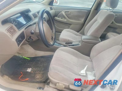 Zdjęcie 7 z 11 samochodu: 1997 TOYOTA CAMRY LE VIN:JT2BG22K5V0079860 - miniatura