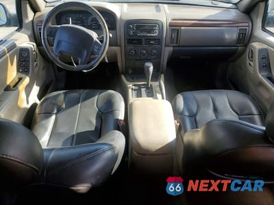 Zdjęcie 8 z 12 samochodu: 2000 JEEP GRAND CHEROKEE LAREDO VIN:1J4G248S2YC227054 - miniatura
