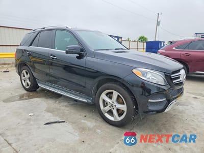 Czwarte zdjęcie samochodu z boku: 2018 MERCEDES-BENZ GLE 350 VIN:4JGDA5JB3JB076387 - miniatura