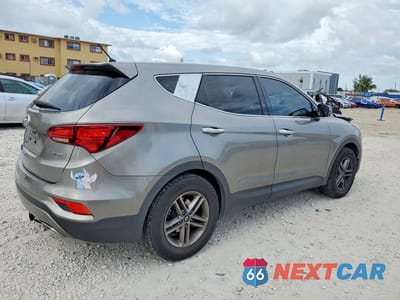 Trzecie zdjęcie samochodu z tyłu: 2018 HYUNDAI SANTA FE SPORT 2.4L VIN:5NMZT3LB4JH080613 - miniatura