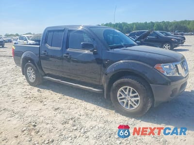 Czwarte zdjęcie samochodu z boku: 2017 NISSAN FRONTIER SV VIN:1N6DD0ER6HN771782 - miniatura