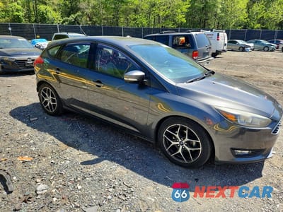 Czwarte zdjęcie samochodu z boku: 2017 FORD FOCUS SEL VIN:1FADP3M2XHL252462 - miniatura