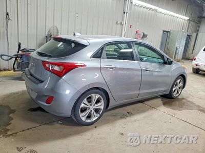 Trzecie zdjęcie samochodu z tyłu: 2014 HYUNDAI ELANTRA GT BASE VIN:KMHD35LH1EU224509 - miniatura