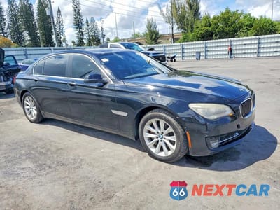 Czwarte zdjęcie samochodu z boku: 2015 BMW 740 LI VIN:WBAYE4C55FD946919 - miniatura