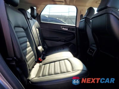 Zdjęcie 11 z 13 samochodu: 2021 FORD EDGE SEL VIN:2FMPK4J90MBA12646 - miniatura