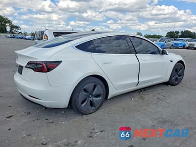 Trzecie zdjęcie samochodu z tyłu: 2019 TESLA MODEL 3 VIN:5YJ3E1EA7KF426584 - miniatura