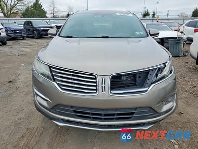 Piąte zdjęcie samochodu w środku: 2016 LINCOLN MKC PREMIERE VIN:5LMCJ1D91GUJ11631 - miniatura