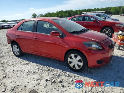 Czwarte zdjęcie samochodu z boku: 2009 TOYOTA YARIS BASE VIN:JTDBT903894046261 - miniatura