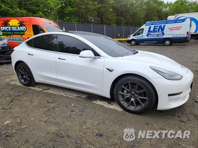 Czwarte zdjęcie samochodu z boku: 2018 TESLA MODEL 3 VIN:5YJ3E1EB6JF108608 - miniatura