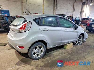 Trzecie zdjęcie samochodu z tyłu: 2016 FORD FIESTA SE VIN:3FADP4EJ6GM121103 - miniatura
