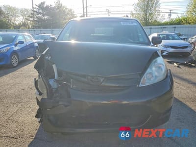 Piąte zdjęcie samochodu w środku: 2010 TOYOTA SIENNA LE 7-PASSENGER VIN:5TDKK4CC5AS327184 - miniatura