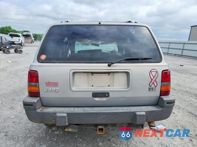 Zdjęcie 6 z 12 samochodu: 1995 JEEP GRAND CHEROKEE LAREDO VIN:1J4GZ58Y0SC553643 - miniatura